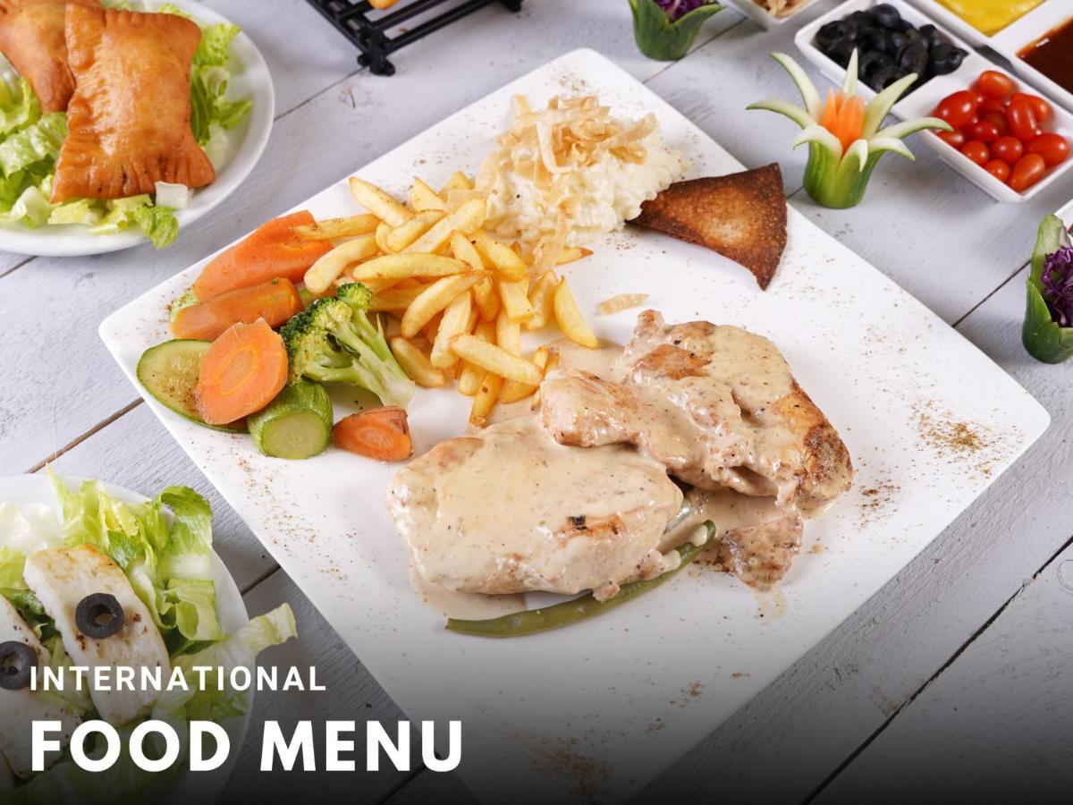 Al Joude Hotel 이르빗 외부 사진