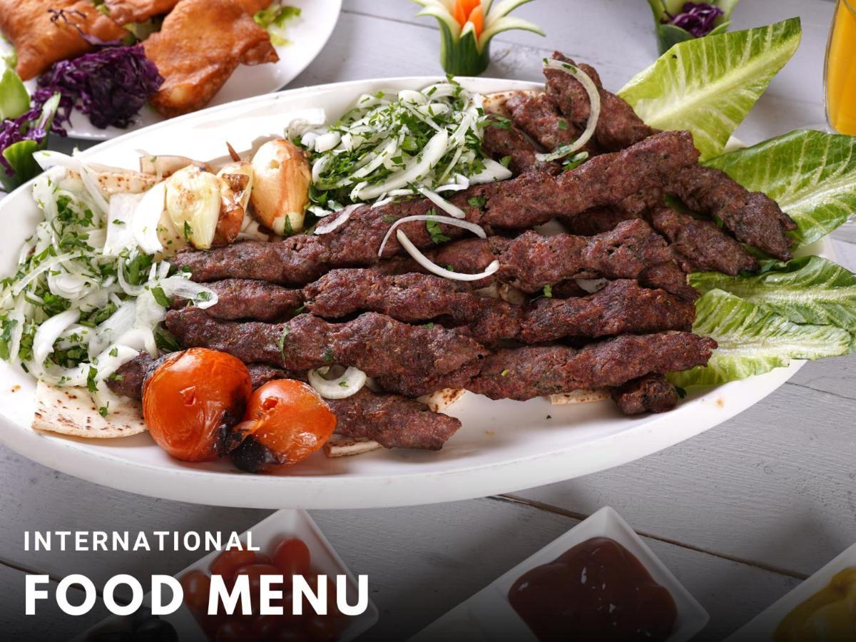 Al Joude Hotel 이르빗 외부 사진